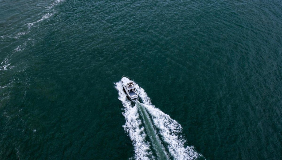 A boat is traveling through the water.